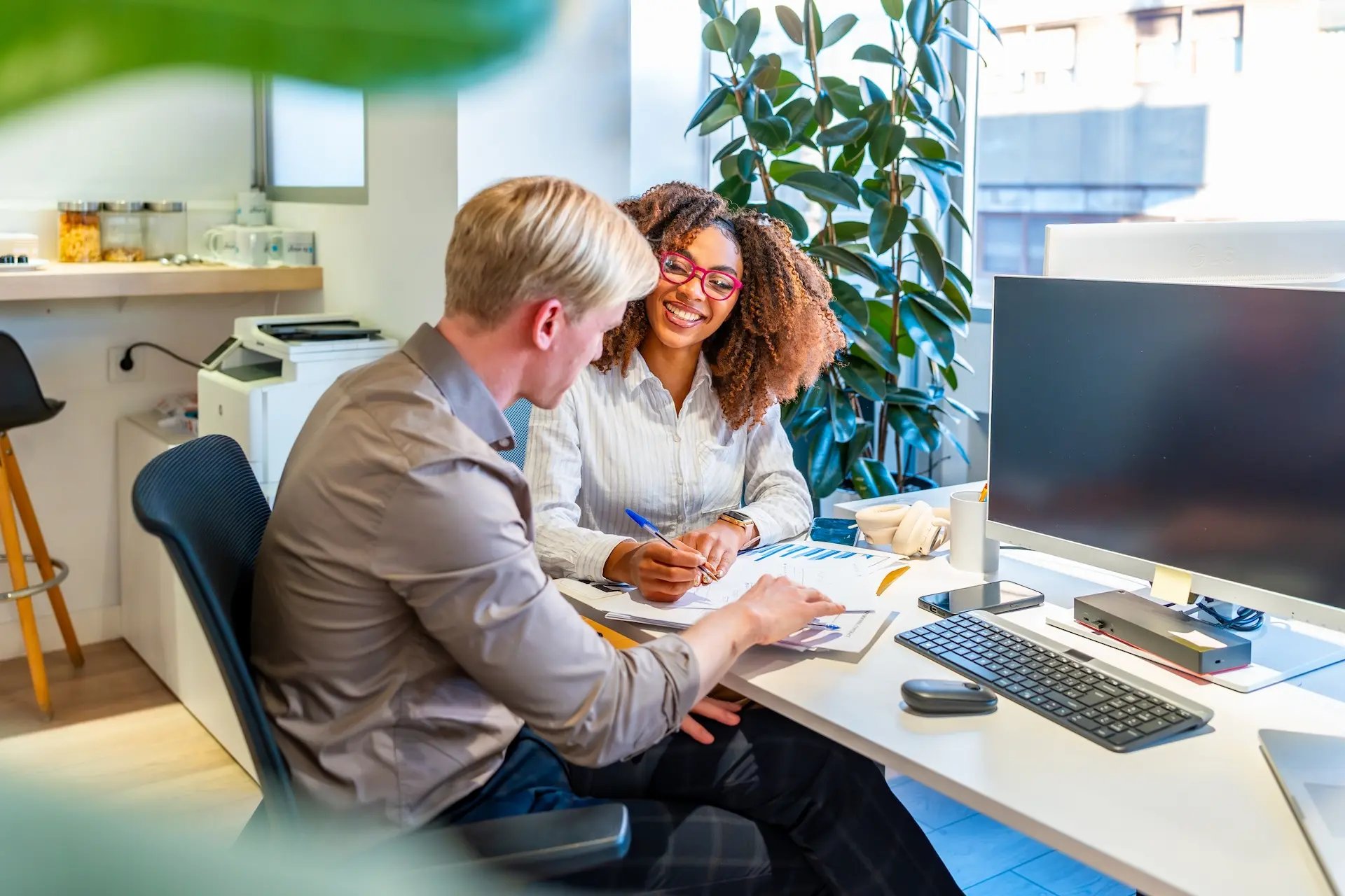 woman and man working together